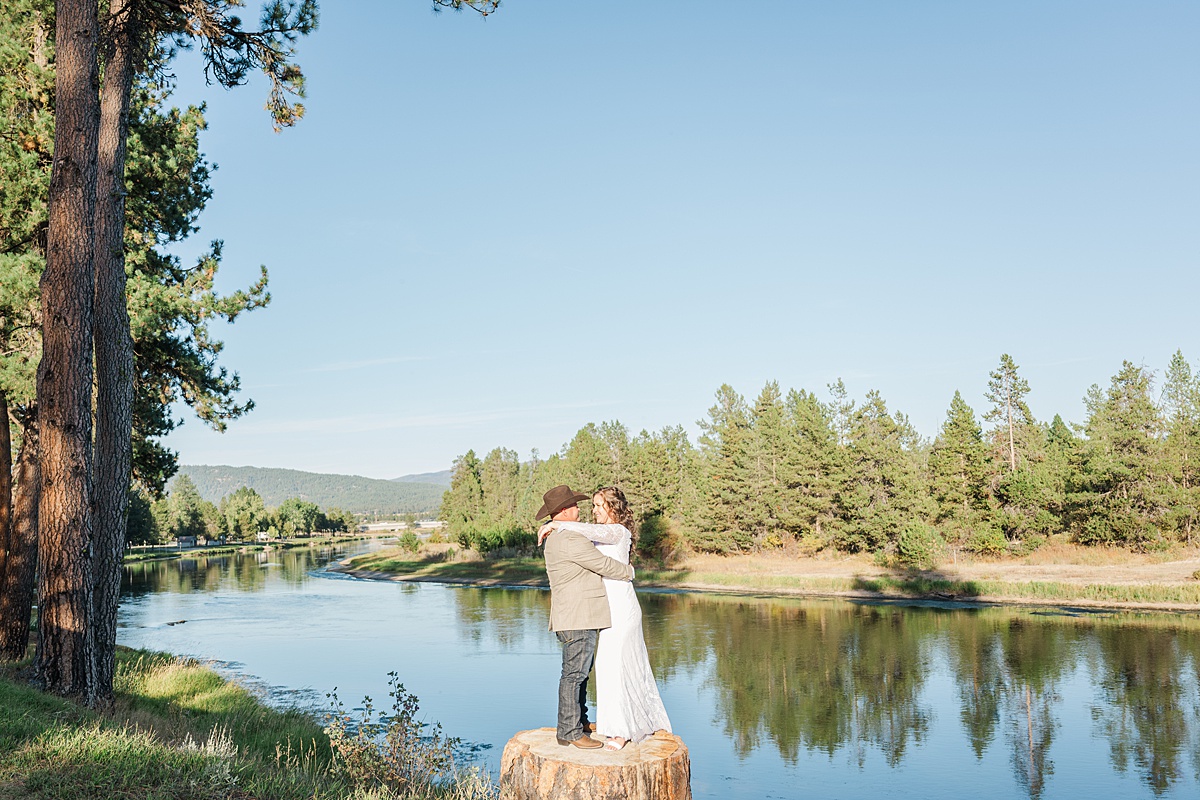 bride and groom sunset portraits at riverside pines wedding venue