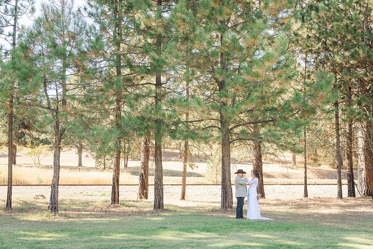 bride and groom portraits at riverside pines wedding venue