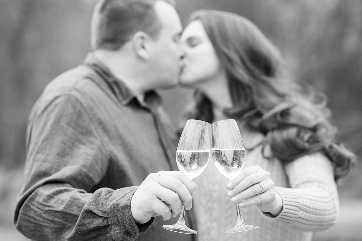 champagne toast at an engagement session at Kathryn Albertsons park